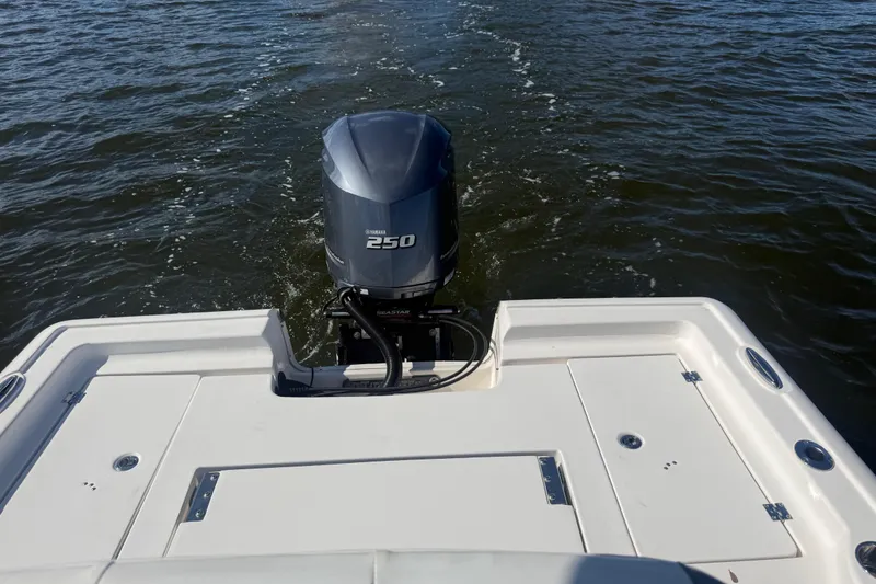 Slide: The Image of 2020 Tidewater 2300 Carolina Bay boat with Yamaha 250 engine on water. - 16