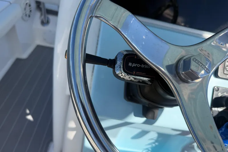 Slide: The Image of Steering wheel of 2020 Tidewater 2300 Carolina Bay boat with Pro-Trim control. - 31