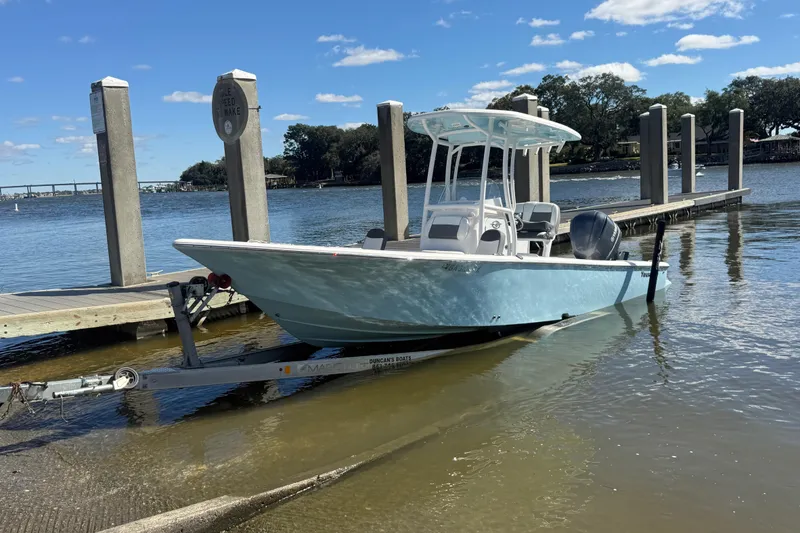 Slide: The Image of 2020 Tidewater 2300 Carolina Bay boat at a dock, ready for launch. - 34