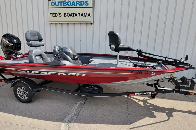 The Image of 2022 Bass Tracker Pro Team 175 XTE boat, red, parked at Ted's Boatarama. - 0