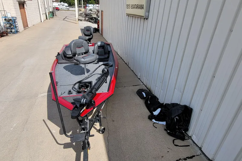 Slide: The Image of 2022 Bass Tracker Pro Team 175 XTE boat parked outside Ted's Boatarama. - 3