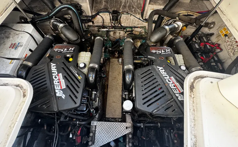 Slide: The Image of Engine room of a 2007 Sea Ray 38 Sundancer with twin Mercury engines. - 22