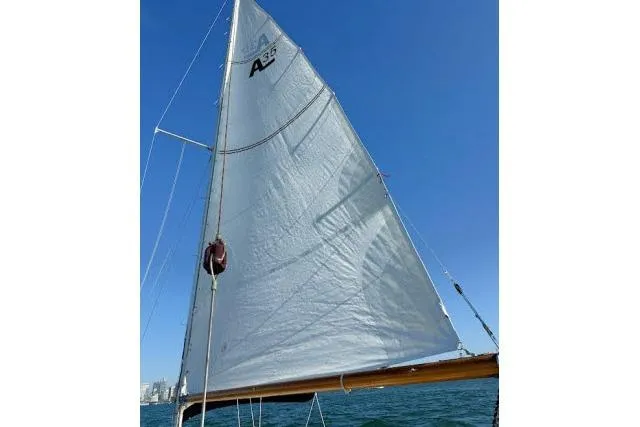 Slide: The Image of Sailing on a 1965 Pearson Alberg 35 with clear blue skies. - 30
