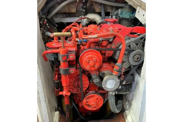 Slide: The Image of Red engine of a 1965 Pearson Alberg 35 sailboat, detailed view. - 32