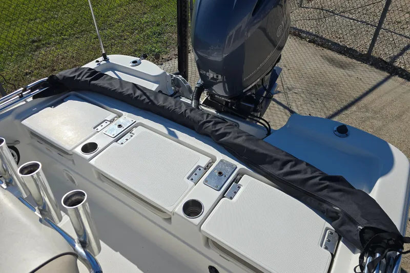 Slide: The Image of 2017 NauticStar 215 XTS boat with Yamaha outboard motor and rod holders. - 11