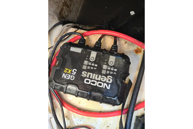 Slide: The Image of NOCO Genius GEN 5X2 battery charger in 2017 NauticStar 215 XTS boat. - 19