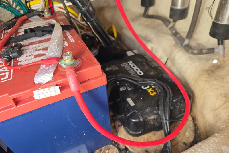 Slide: The Image of Battery and wiring setup in a 2017 NauticStar 215 XTS boat. - 21