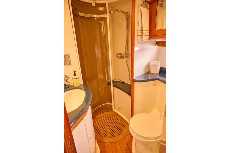 Slide: The Image of Bathroom interior of 2000 Sunseeker Camargue 50 yacht with shower and sink. - 28