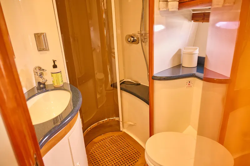 Slide: The Image of Luxurious bathroom in 2000 Sunseeker Camargue 50 yacht with modern amenities. - 29