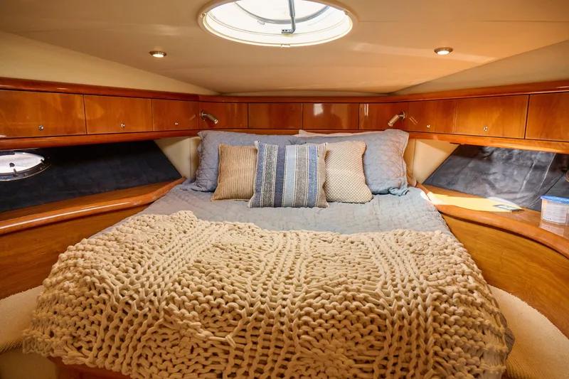 Slide: The Image of Luxurious cabin interior of 2000 Sunseeker Camargue 50 yacht with cozy bedding. - 32