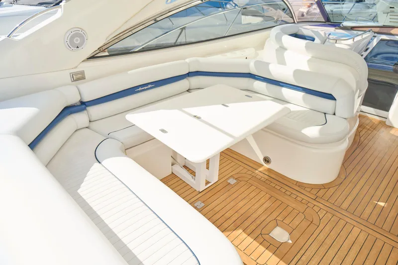 Slide: The Image of Luxurious Sunseeker Camargue 50 yacht interior with white seating and wooden flooring, 2000 model. - 37