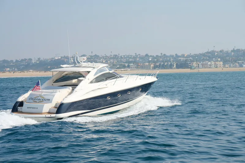 Slide: The Image of Sunseeker Camargue 50 yacht cruising near Newport Beach, 2000 model. - 64