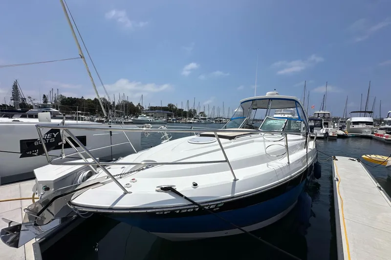 Slide: The Image of 2020 Monterey 355 Sport Yacht docked at marina under clear blue sky. - 10