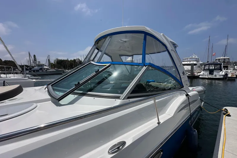 Slide: The Image of 2020 Monterey 355 Sport Yacht docked at marina under clear blue sky. - 11