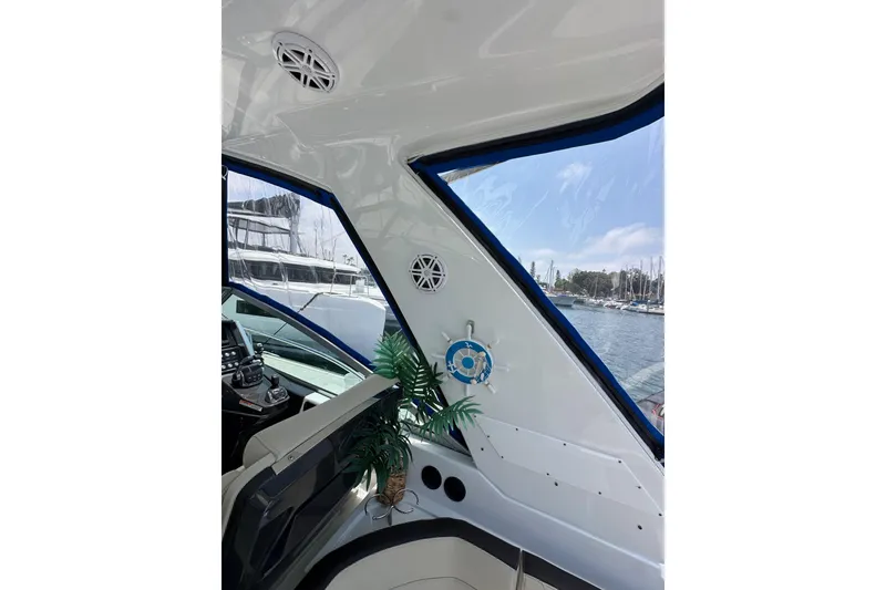 Slide: The Image of Interior view of 2020 Monterey 355 Sport Yacht with marina backdrop. - 20