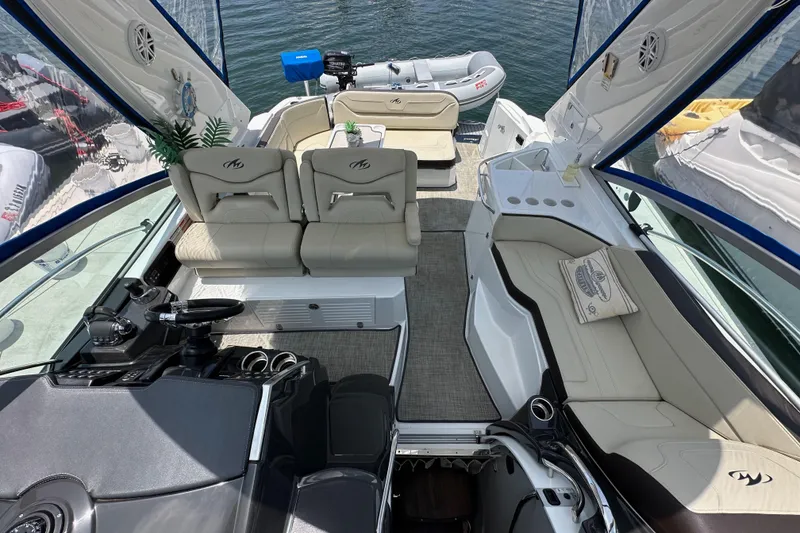 Slide: The Image of Luxurious interior of 2020 Monterey 355 Sport Yacht with plush seating and modern helm. - 35