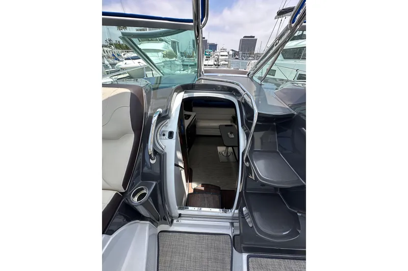 Slide: The Image of 2020 Monterey 355 Sport Yacht interior view with seating and steps. - 36