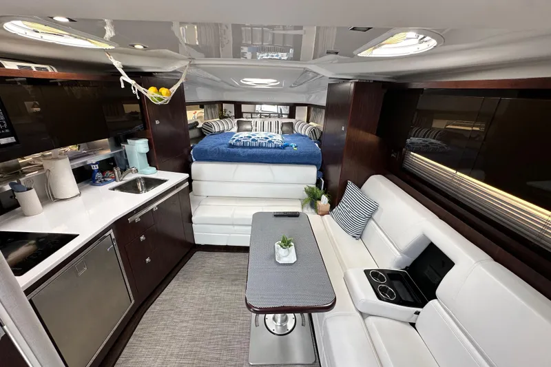 Slide: The Image of Luxurious interior of 2020 Monterey 355 Sport Yacht with modern kitchen and cozy seating. - 38