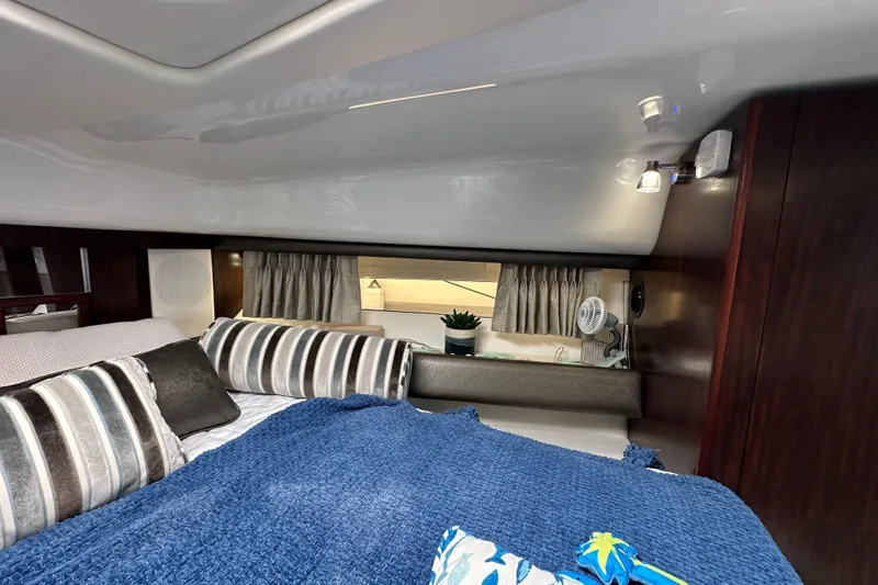 Slide: The Image of Interior cabin of 2020 Monterey 355 Sport Yacht with cozy bedding and modern decor. - 45