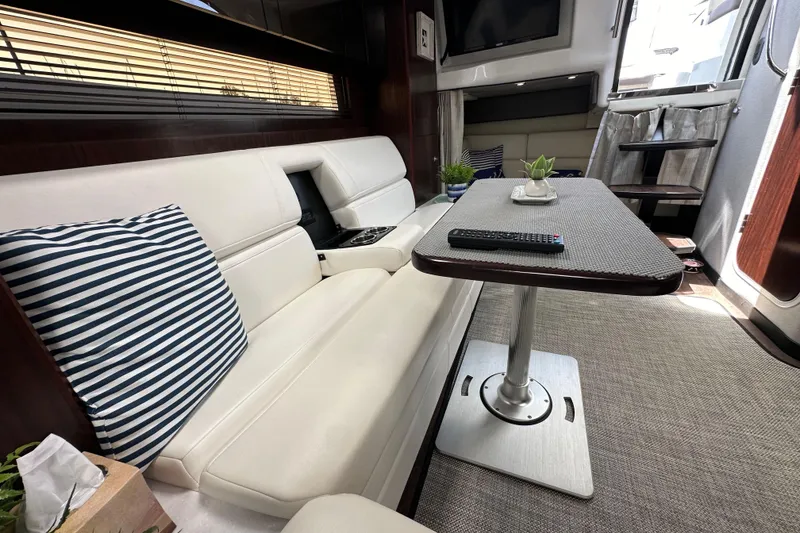 Slide: The Image of Luxurious interior of 2020 Monterey 355 Sport Yacht with plush seating and modern decor. - 49