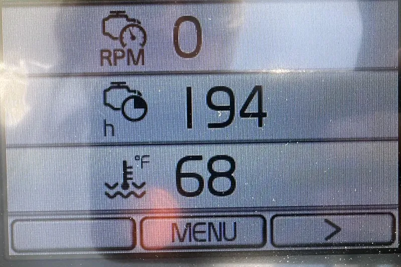 Slide: The Image of Display screen of 2020 Monterey 355 Sport Yacht showing RPM, engine hours, and temperature. - 69