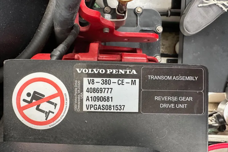 Slide: The Image of Volvo Penta engine label on 2020 Monterey 355 Sport Yacht, showing specifications and safety warning. - 71