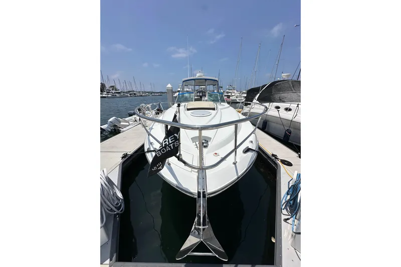 Slide: The Image of 2020 Monterey 355 Sport Yacht docked at marina under clear blue sky. - 9