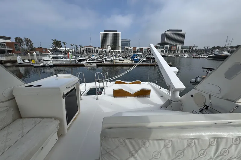 Slide: The Image of Open fridge on 1998 Bayliner 4788 Pilot House Motoryacht, showing empty shelves. - 17