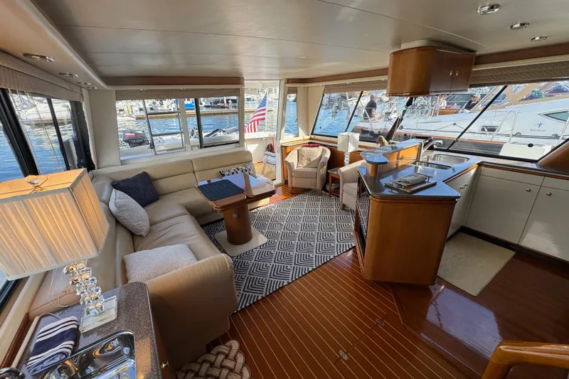 Slide: The Image of Luxurious interior of 1998 Bayliner 4788 Pilot House Motoryacht with elegant seating and modern amenities. - 59