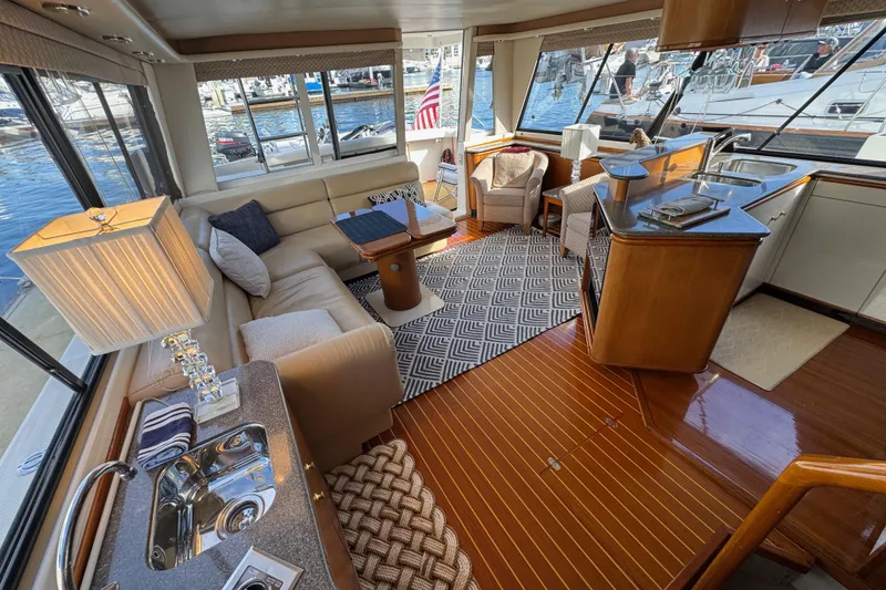 Slide: The Image of Luxurious interior of 1998 Bayliner 4788 Pilot House Motoryacht with elegant seating and modern amenities. - 60