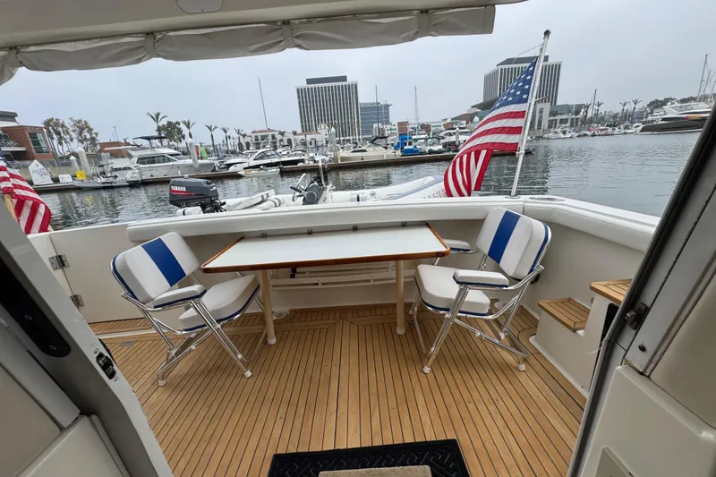 Slide: The Image of 1998 Bayliner 4788 Pilot House Motoryacht with inflatable boat and davit system. - 7