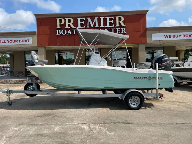 Slide: The Image of 2024 NauticStar 191H boat on trailer at Premier Boat Center. - 1