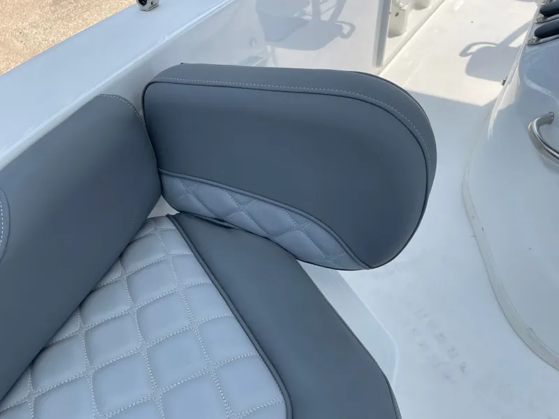 Slide: The Image of 2024 NauticStar 191H boat seat with gray quilted upholstery. - 25