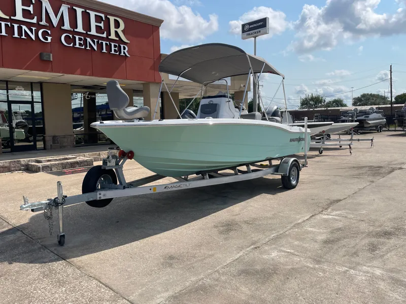 Slide: The Image of 2024 NauticStar 191H boat on trailer at Premier Boating Center. - 3
