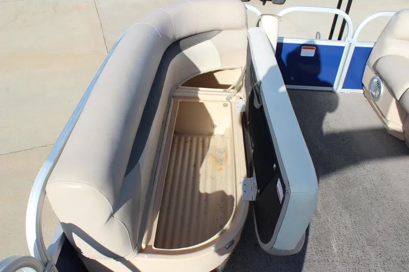 Slide: The Image of 2016 Sun Tracker Party Barge 16 DLX with open storage compartment. - 19