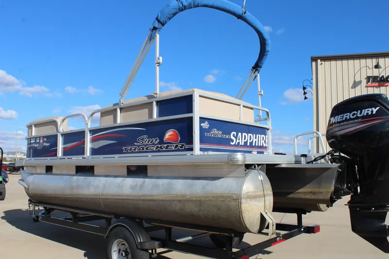 Slide: The Image of 2016 Sun Tracker Party Barge 16 DLX pontoon boat with Mercury engine on trailer. - 5
