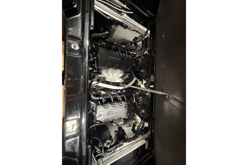 Slide: The Image of Engine compartment of 2026 Yamaha Boats 255 XD, showcasing dual SVHO engines. - 12