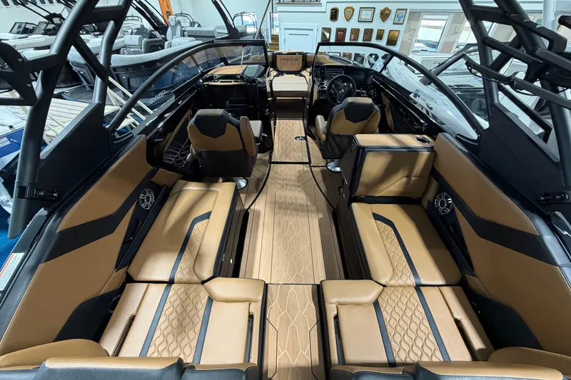 Slide: The Image of 2026 Yamaha Boats 255 XD interior with luxurious seating and modern design. - 13