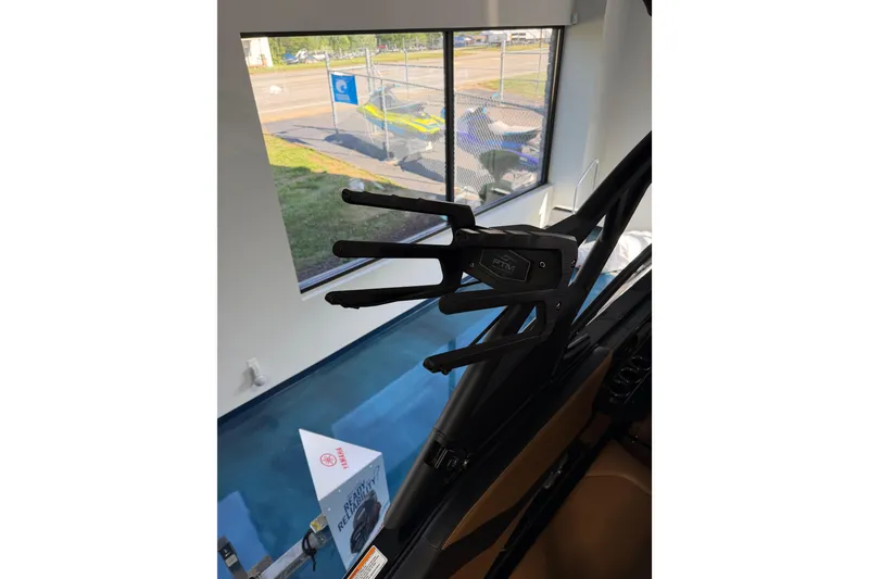 Slide: The Image of 2026 Yamaha Boats 255 XD interior detail with window view. - 29