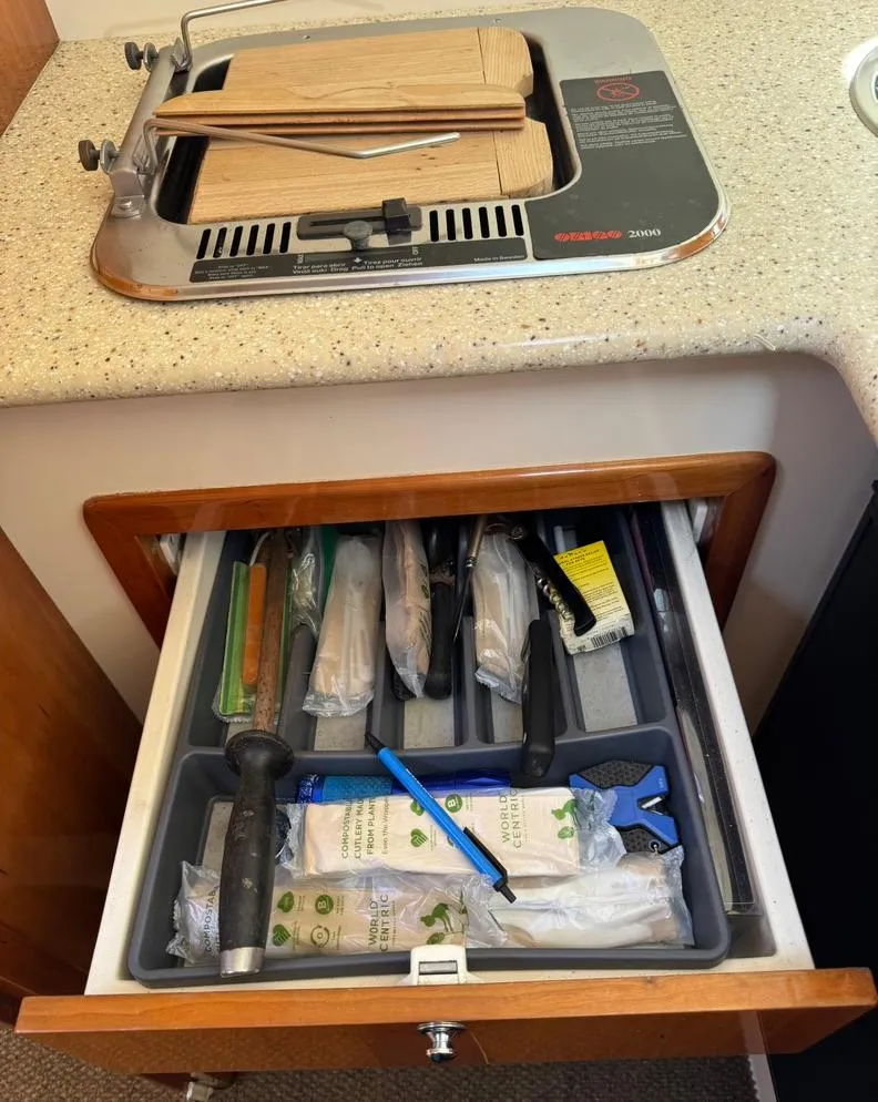 Slide: The Image of Drawer with kitchen utensils under Rodman 800 stove, 2004 model. - 29