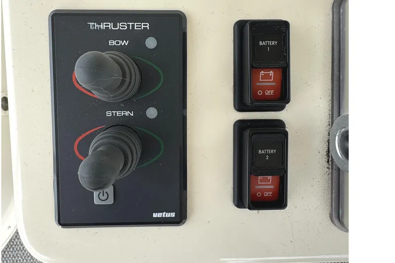 Slide: The Image of 1991 Viking 53 Convertible yacht helm with Garmin navigation system and control panel. - 21