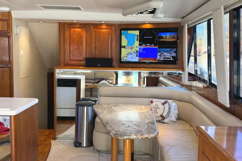 Slide: The Image of Control panel of a 1991 Viking 53 Convertible boat with thruster and battery switches. - 24