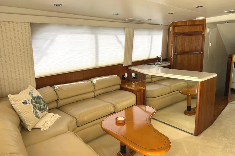 Slide: The Image of Control panel of a 1991 Viking 53 Convertible boat with knobs and ACR electronics. - 25