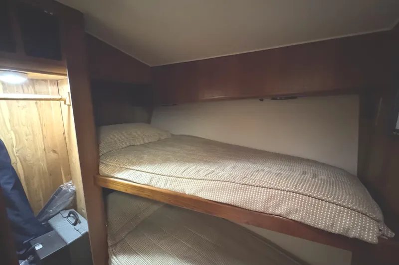 Slide: The Image of Interior of 1991 Viking 53 Convertible yacht kitchen with wood cabinetry and appliances. - 39