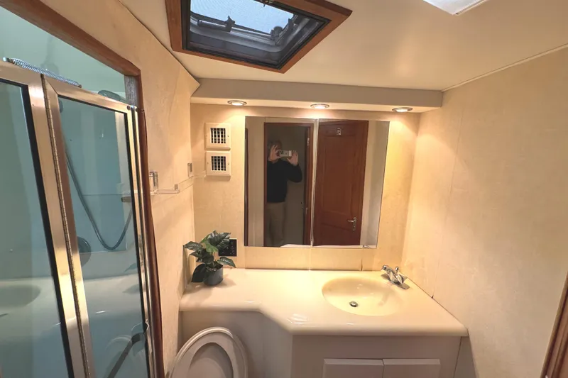 Slide: The Image of Bathroom interior of 1991 Viking 53 Convertible yacht with shower and sink. - 48