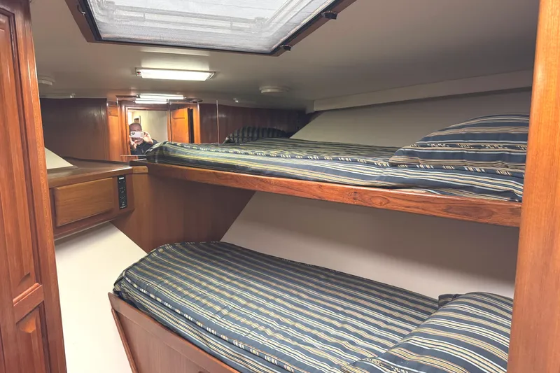 Slide: The Image of Bathroom interior of 1991 Viking 53 Convertible yacht with skylight and vanity. - 53