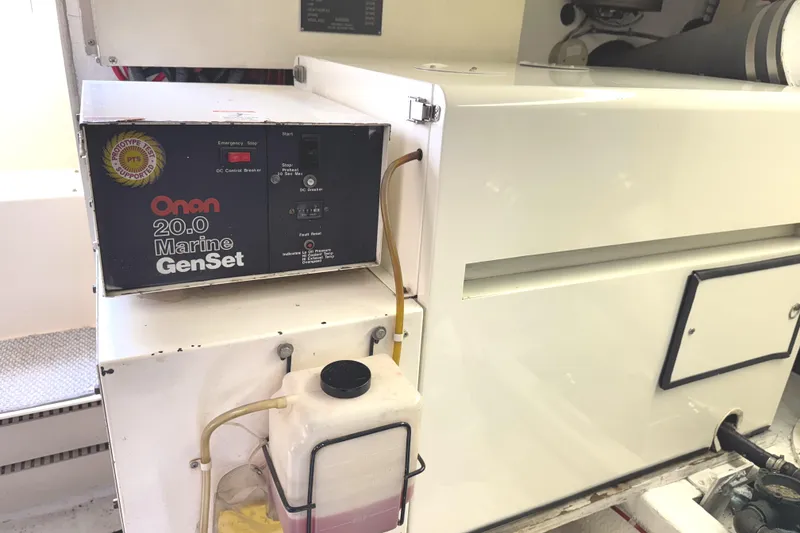 Slide: The Image of Interior hallway of 1991 Viking 53 Convertible yacht with wooden doors and skylight. - 60