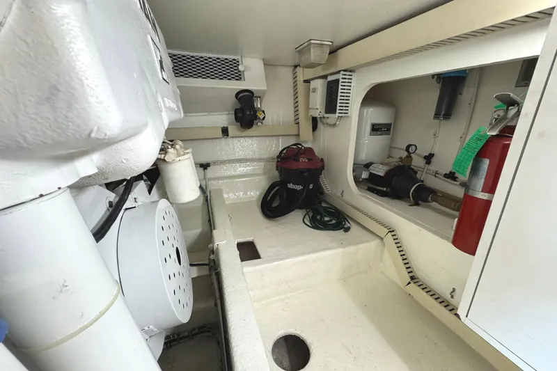 Slide: The Image of Control panel of a 1991 Viking 53 Convertible boat with various gauges and indicators. - 66