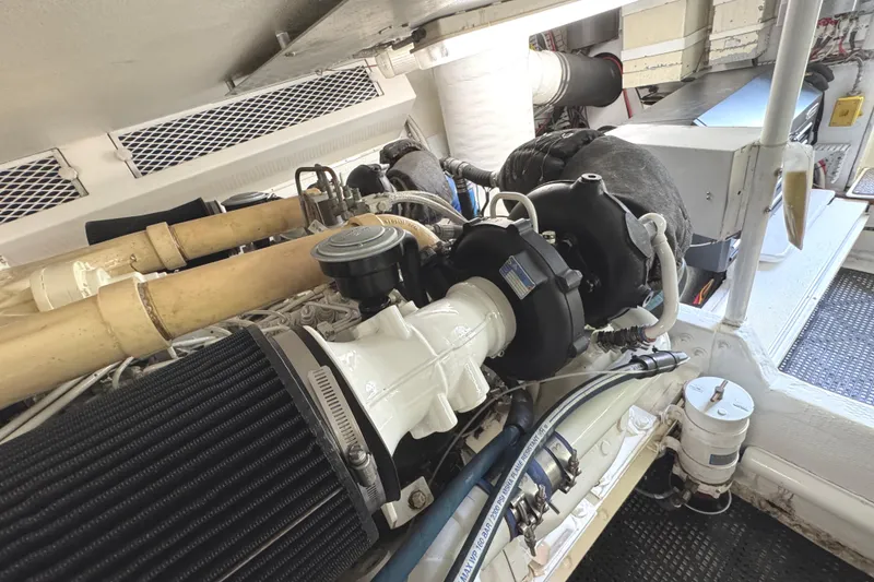 Slide: The Image of Engine room of 1991 Viking 53 Convertible with storage cabinets and equipment. - 71