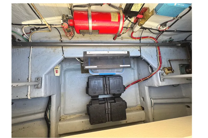 Slide: The Image of Engine room of 1991 Viking 53 Convertible with fire extinguisher and surveillance camera. - 77